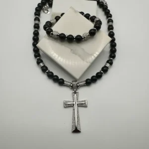Black beaded necklace and bracelet with cross.
