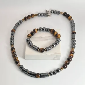 A beaded necklace and bracelet set with gray and brown beads.