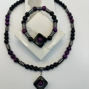 Purple and black beaded necklace and bracelet.