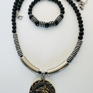 Black and silver beaded necklace with matching bracelet and dragon pendant.