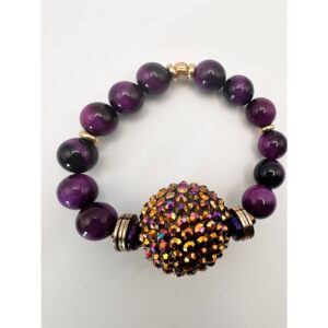 Purple beaded bracelet with a multicolored centerpiece bead.