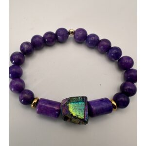Bracelet with purple beads and a central iridescent stone.